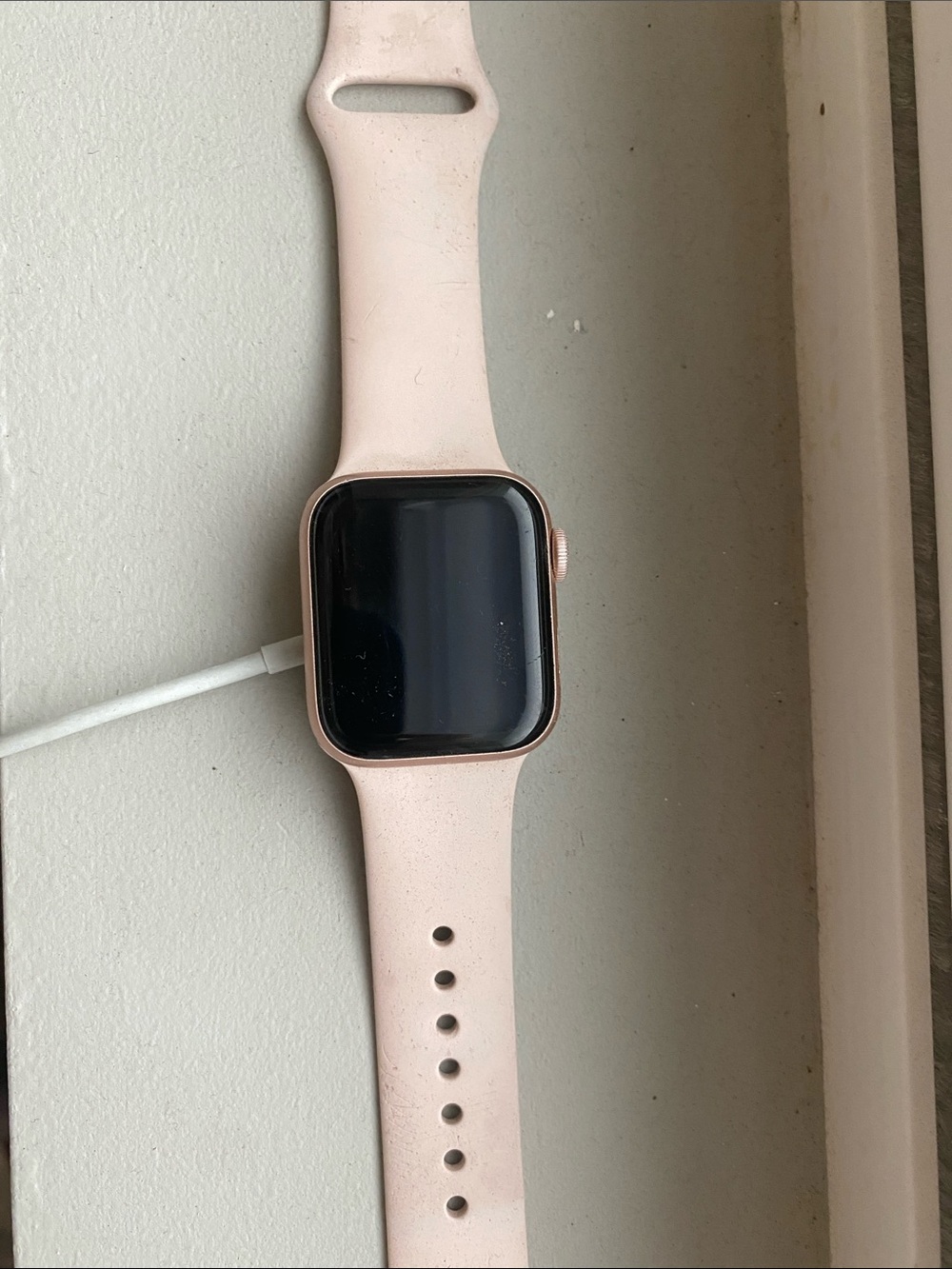 Apple Watch with Pink Silicone Band and charger